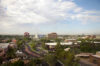 View from top floor of a high rise in Mesa Arizona. Looking southeast. Mesa Arts Center is modern blue building in center. Panaorama view: