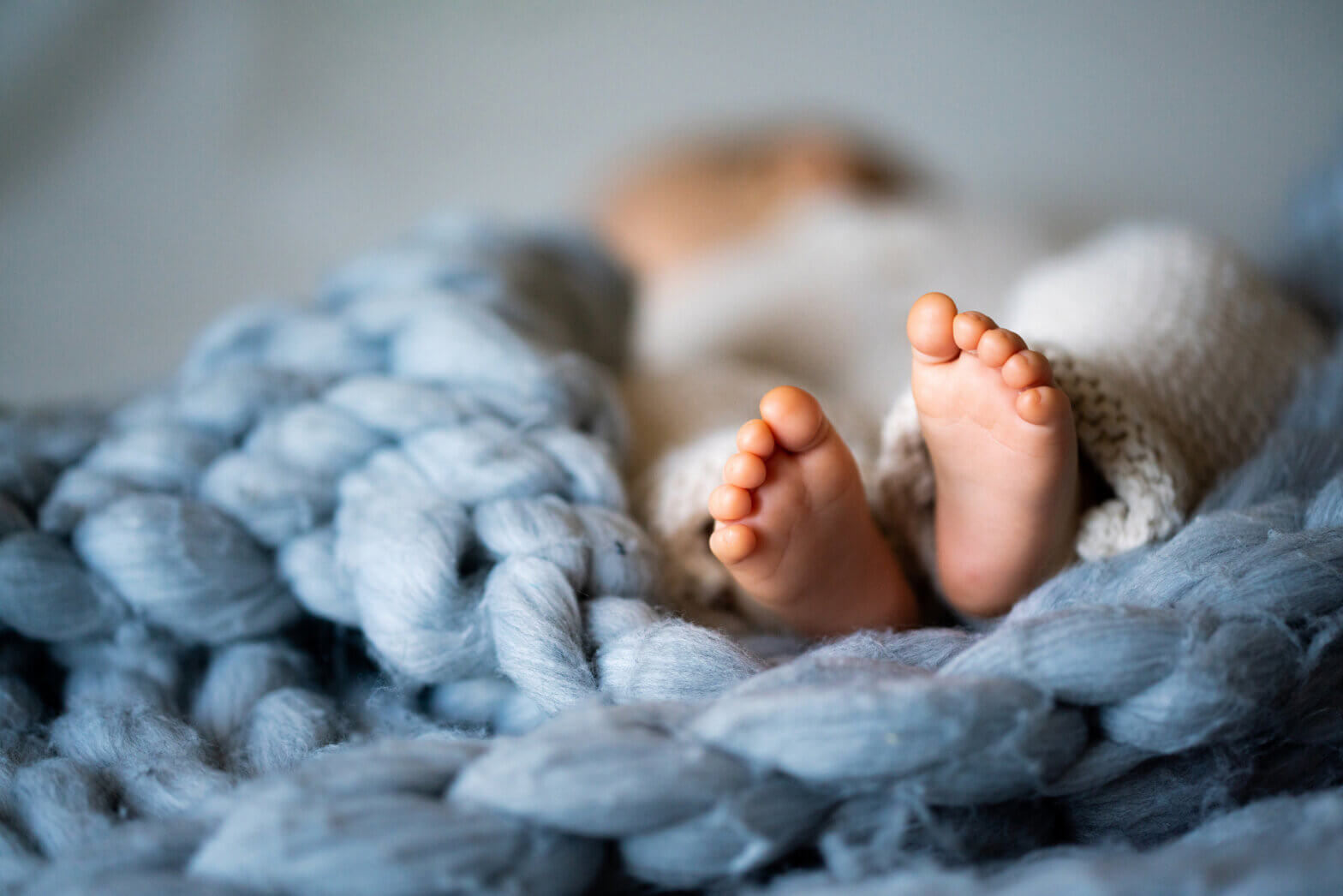 Baby feet on blanket